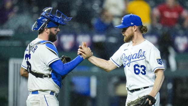 May 19, 2021; Kansas City, Missouri, USA; Kansas City Royals relief pitcher Josh Staumont (63) celebrates with catcher Cam Gallagher (36) after defeating the Milwaukee Brewers at Kauffman Stadium. Mandatory Credit: Jay Biggerstaff-USA TODAY Sports